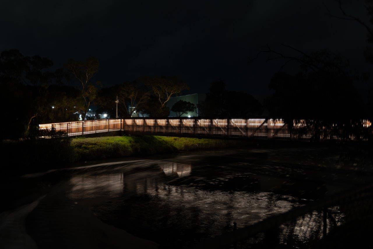 LED handrail system along a wooden walkway at Seaford Wetlands.