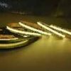 Lightrail COB896.20.RGBW RGBW LED strip glowing warm white.